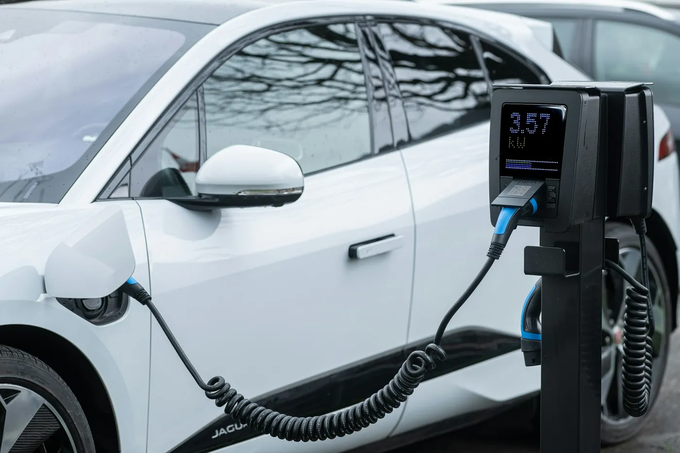 Electric car connected to a charging station